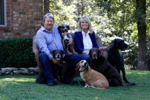 Chef Walt Dotson with his wife and their four fur babies